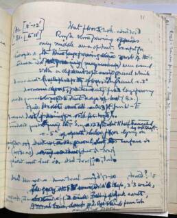 blue ink, almost illegible as one side of text mixes with other